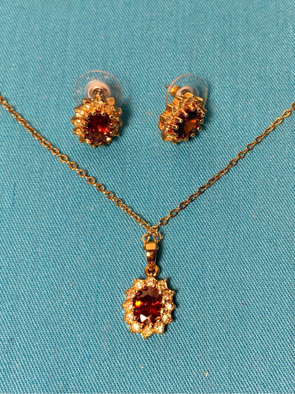 Gold-Tone Red Halo Pendant Necklace with Matching Stud Earrings